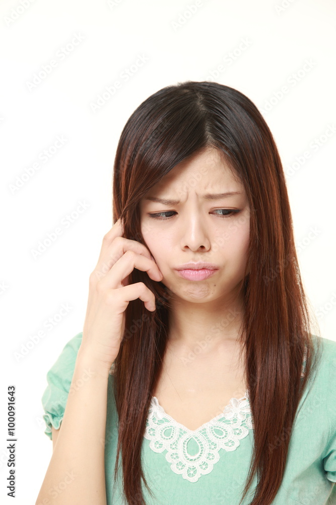 困惑する女性 困惑する女性