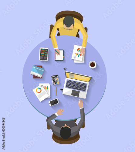 Flat design - business concept - work concept - top view of coworkers  team working together around a desk with a desktop and laptop and tablet, the desk contain a set of objects 
