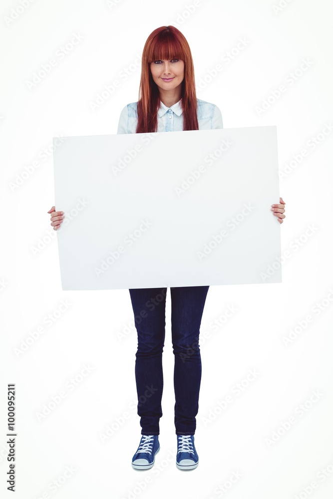 Attractive hipster woman holding white card Attractive hipster woman holding white card
