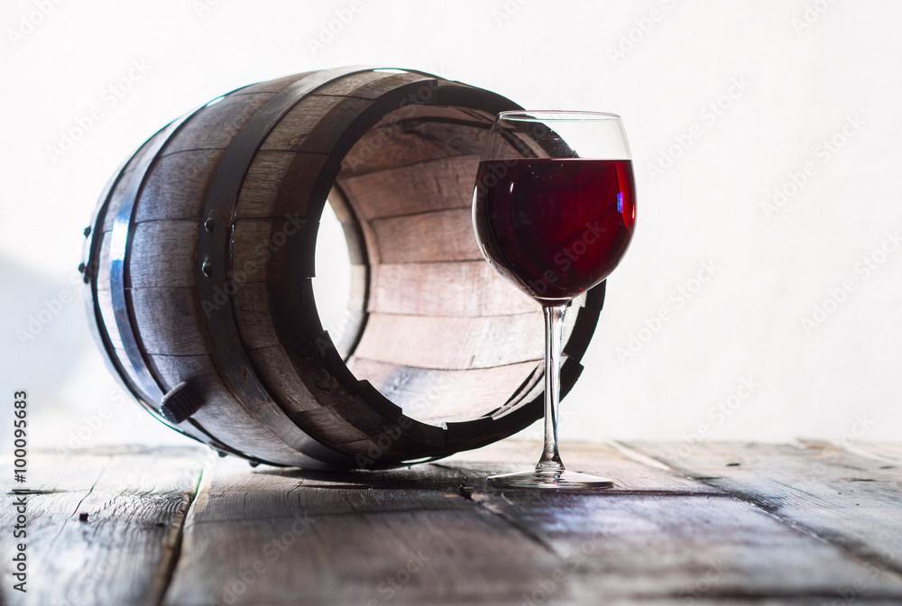 Wineglass and a old barrel