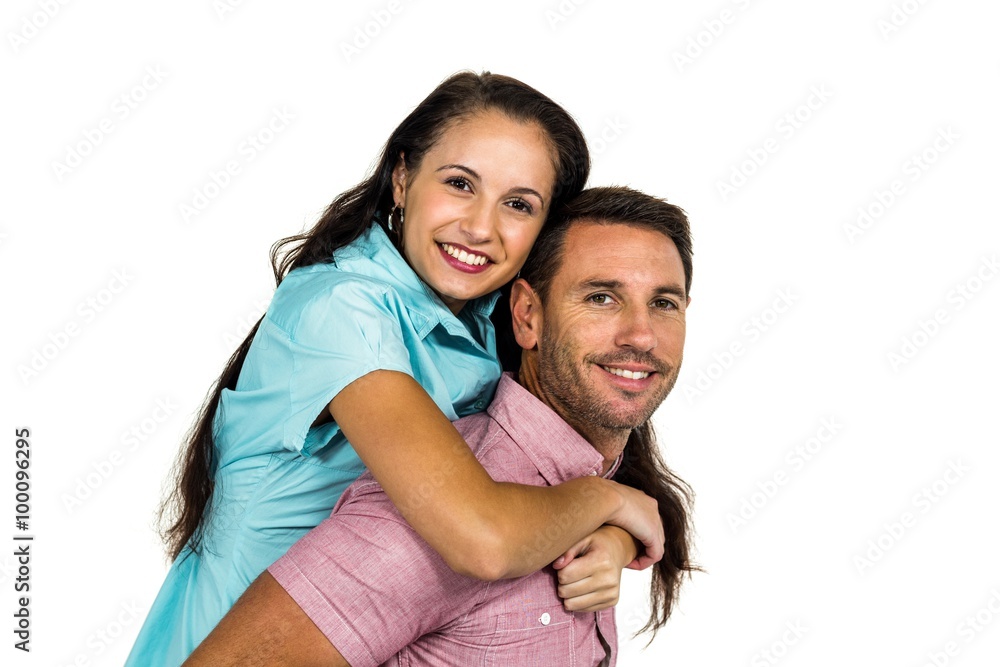 Smiling couple looking at camera Smiling couple looking at camera