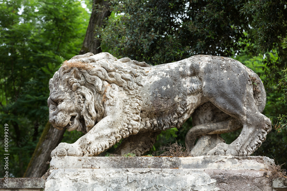 Lion sculpture in Garden of Villa Borghese. Rome, Italy Lion sculpture in Garden of Villa Borghese. Rome, Italy
