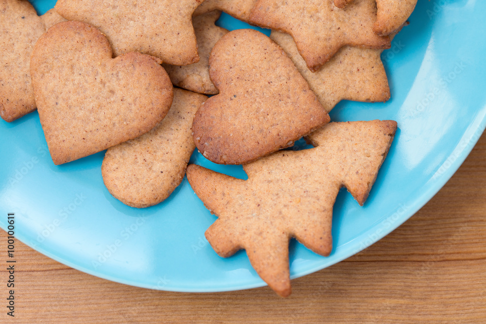 Tasty homemade cookies on blue plate Tasty homemade cookies on blue plate