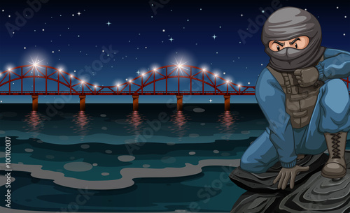 Terrorist sitting by the river