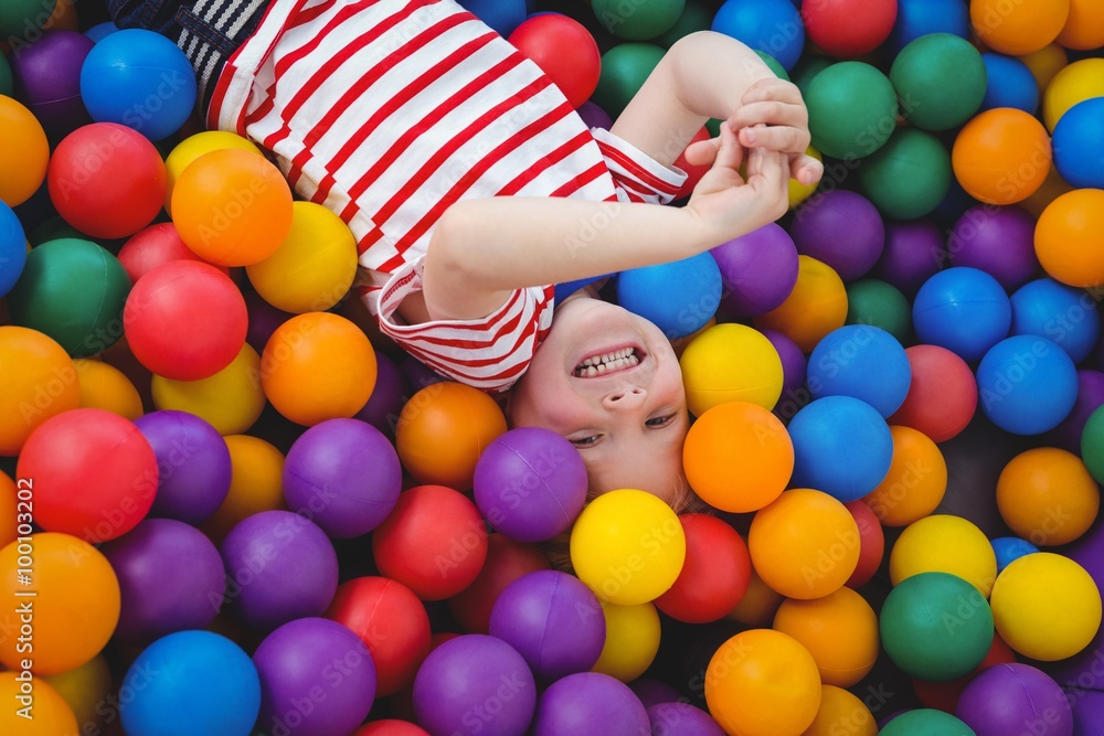 Cute smiling boy in sponge ball pool Stock Photo Adobe Stock