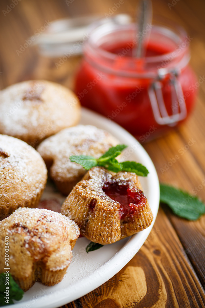 sweet muffins with fruit jam inside sweet muffins with fruit jam inside