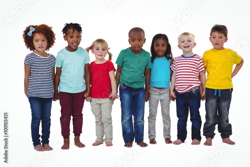 Cute barefooted kids looking at camera