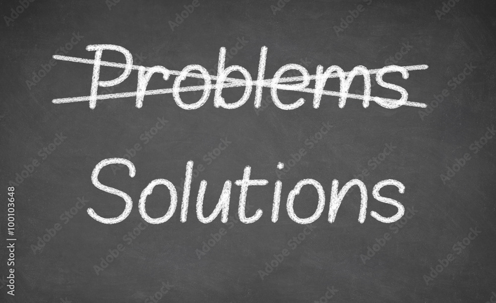 Crossing out problems and writing solutions on a blackboard. Crossing out problems and writing solutions on a blackboard.