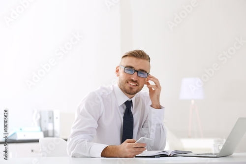 Businessman working with la...