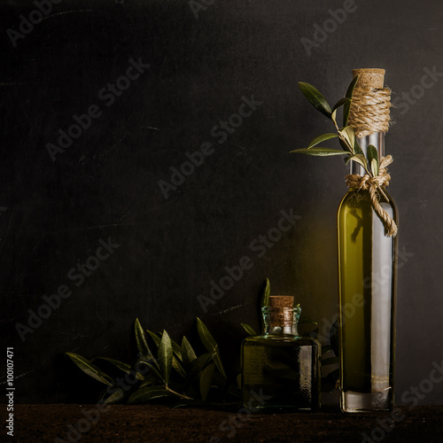 Extra virgin olive oil rusty background