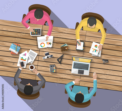 around a desk of wood  with laptop and tablet and smarth-phone. represent a creativity , bright ideas, team corporation.