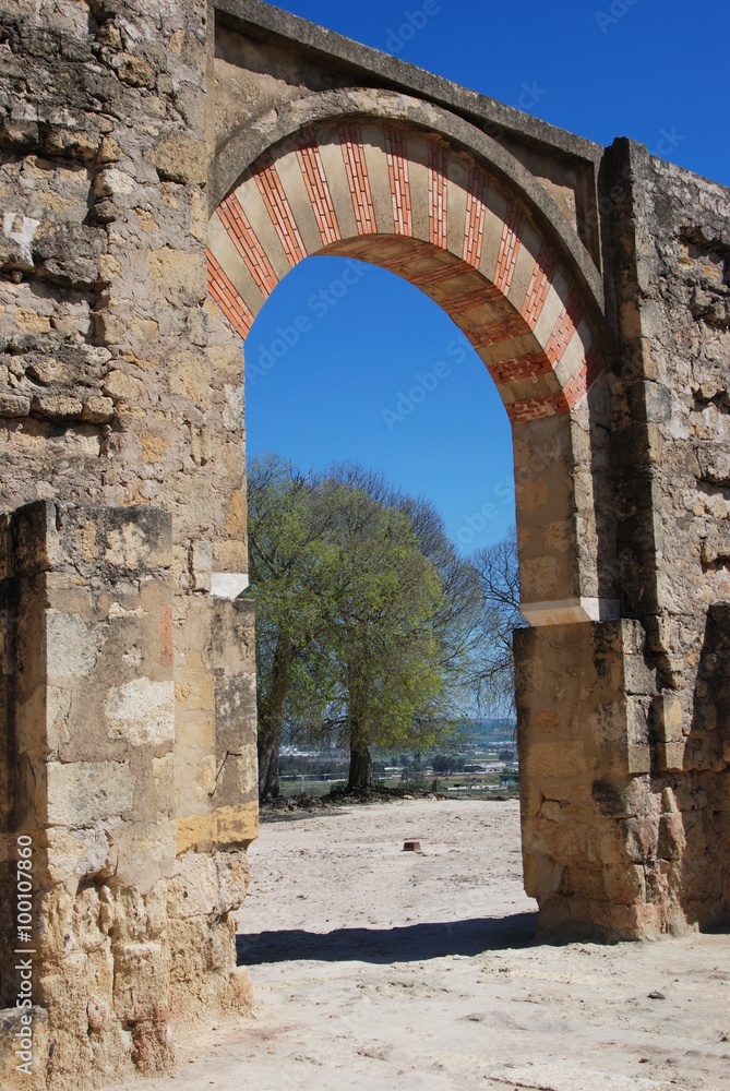 View through a Moorish arch ruin, Medina Azahara.