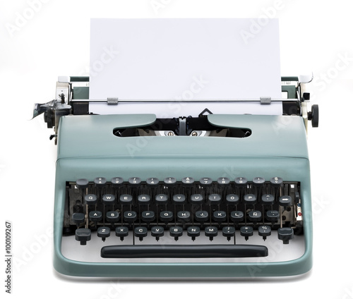 vintage typewriter with blank paper