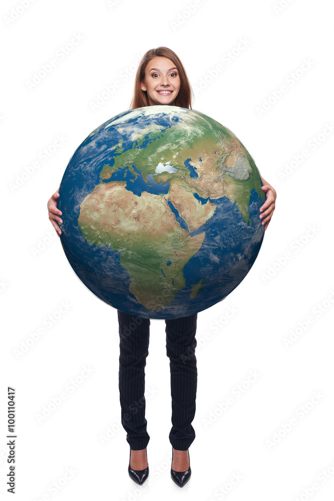Woman in full length holding earth globe Woman in full length holding earth globe