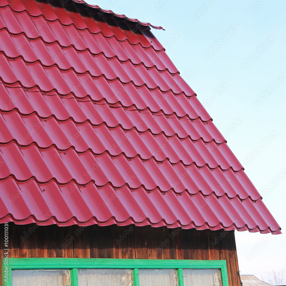 Naklejka premium Roof with metal tile