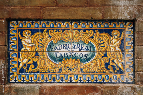 Ceramic tiled sign of Royal Tobacco Factory in Seville, Spain