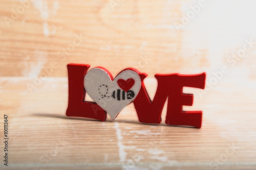 Heart shape on wooden background. Valentines day. Love. Retro