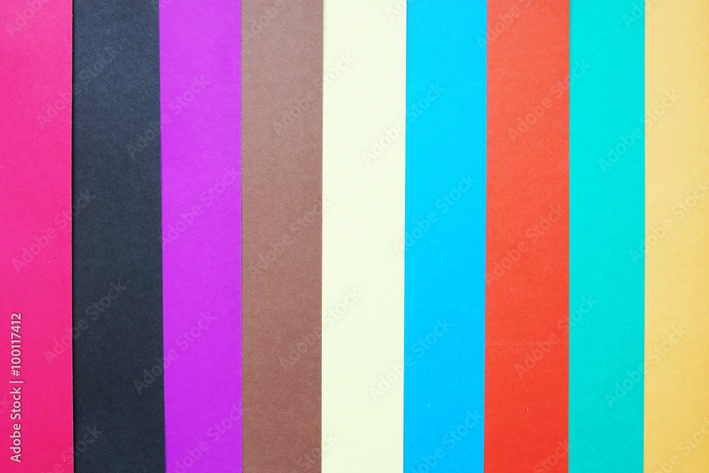 Stripped background made of multicolored paper sheets