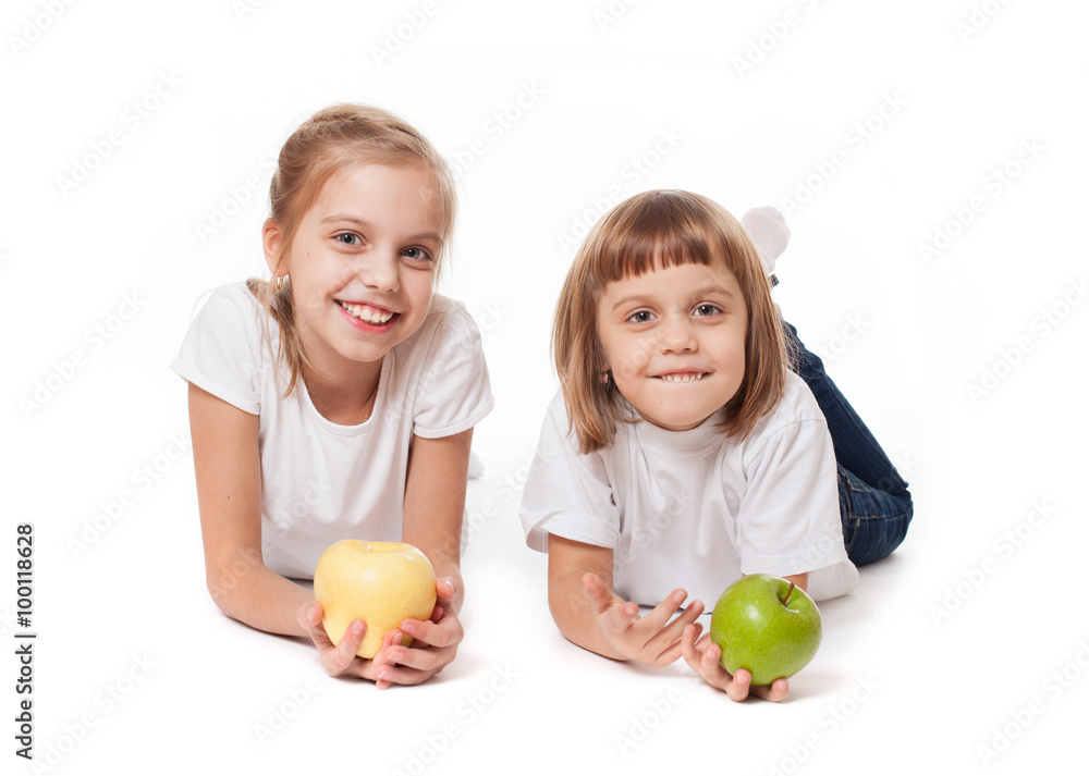Fototapeta premium Happy family sisters and brother with apples