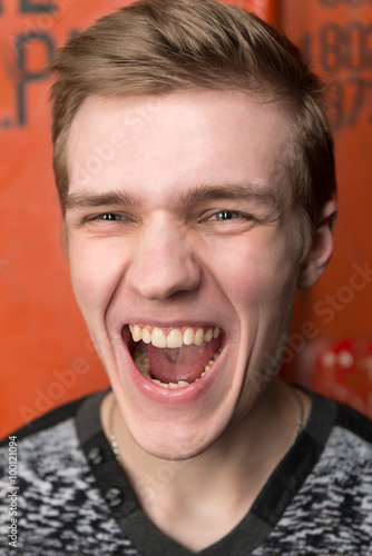 Portrait of screaming young man