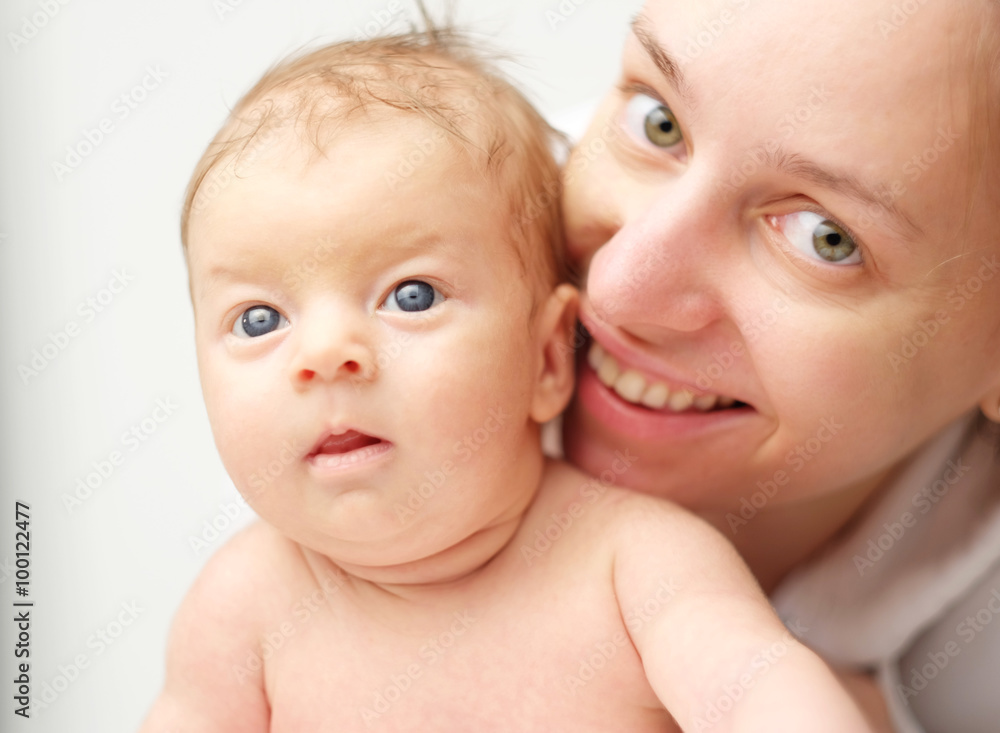 One month old newborn baby with mother One month old newborn baby with mother