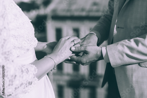 Closeup view of married couple holding hands  © cmirnovalexander