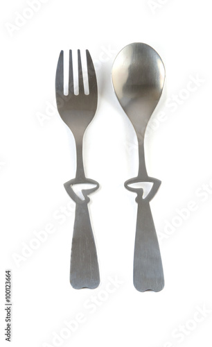 Spoon and fork heart isolated on white background.