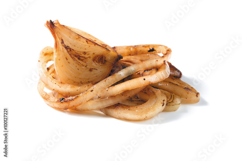 roasted onion pieces on a white background. closeup