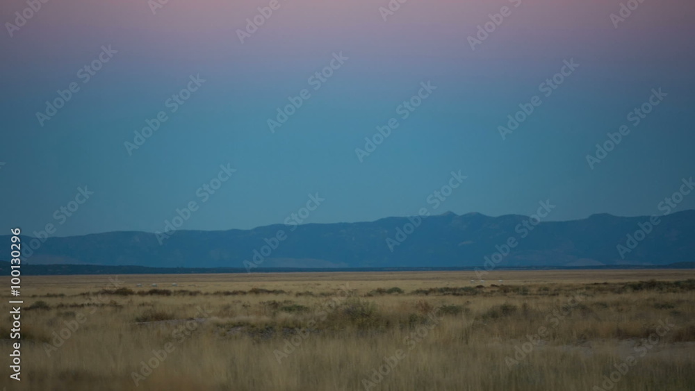 Pan Left Toward Satellite Dish. Camera pans left to a satellite from the Ver Large Array in New Mexico during sunset
Pan Left Toward Satellite Dish. Camera pans left to a satellite from the Ver Large Array in New Mexico during sunset