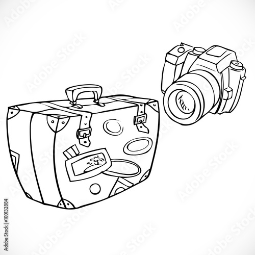 a set of tourist - camera and a suitcase packed full of things