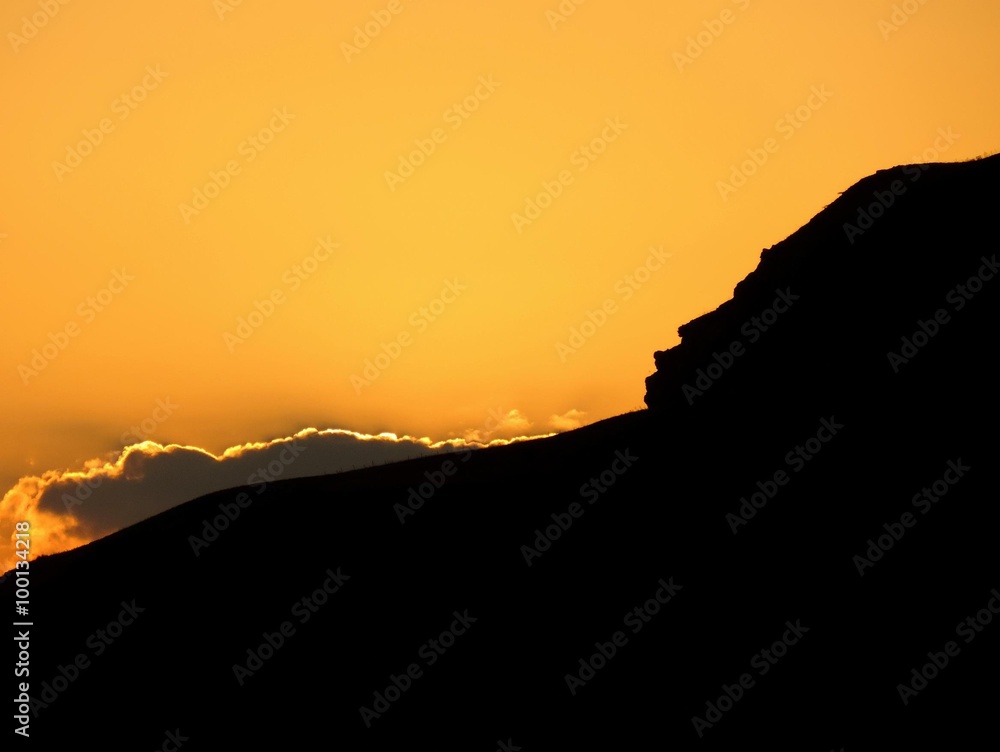 silhouette of mountain in a form of a woman's face