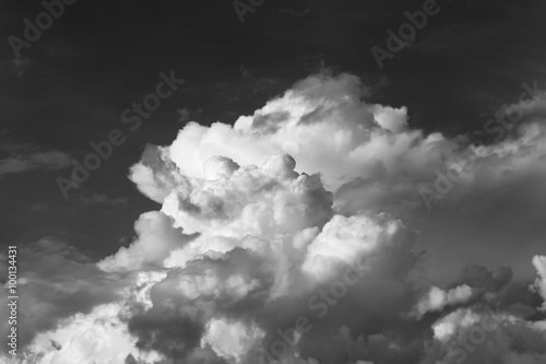 Natural landscape of large cumulus clouds in the sky. Black and white photo