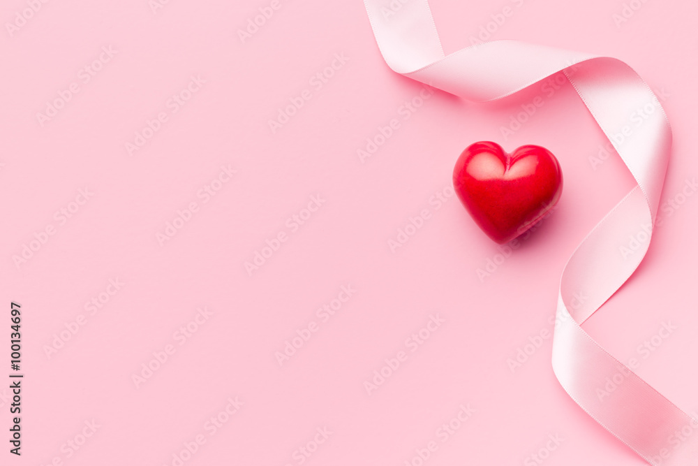 pink ribbon with red heart