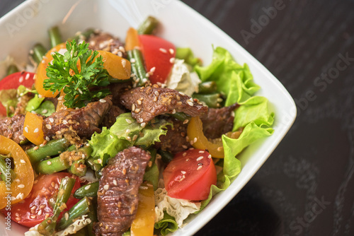 Warm salad with veal