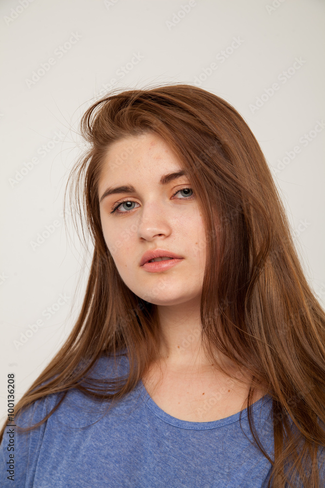 Beautiful young woman in fashion purple leather jacket . Isolated over white background Beautiful young woman in fashion purple leather jacket . Isolated over white background
