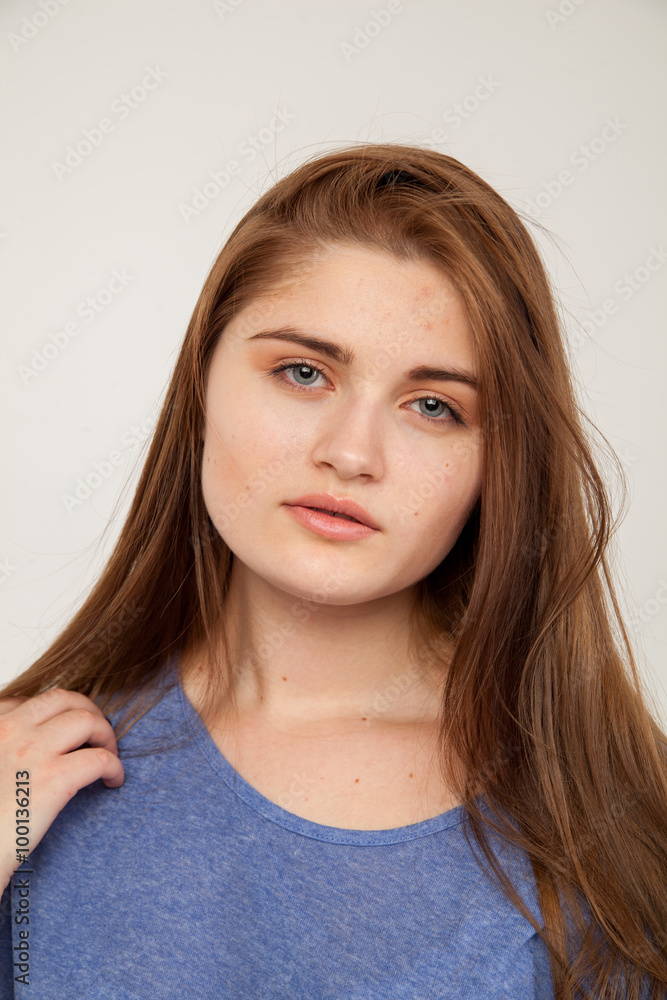 Beautiful young woman in fashion purple leather jacket . Isolated over white background Beautiful young woman in fashion purple leather jacket . Isolated over white background