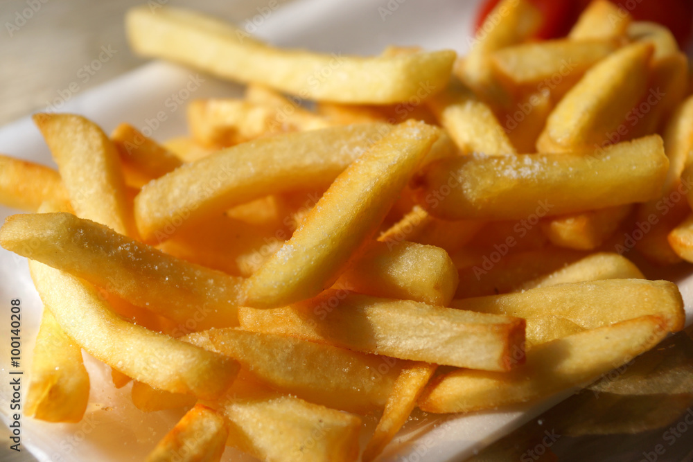 Golden French fries potatoes ready to be eaten Golden French fries potatoes ready to be eaten