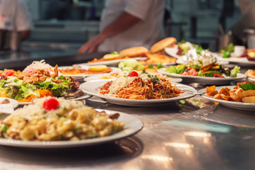 Food orders on the kitchen table in the restaurant