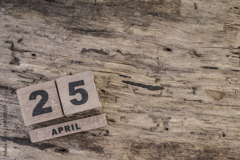 cube calendar on wooden surface for april with copy space cube calendar on wooden surface for april with copy space