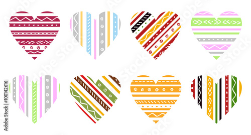 Set of colored striped love hearts. Hand drawing valentine`s day`s design elements, vector. Cute hearts with ethnic red, green, yellow, orange color stripes.