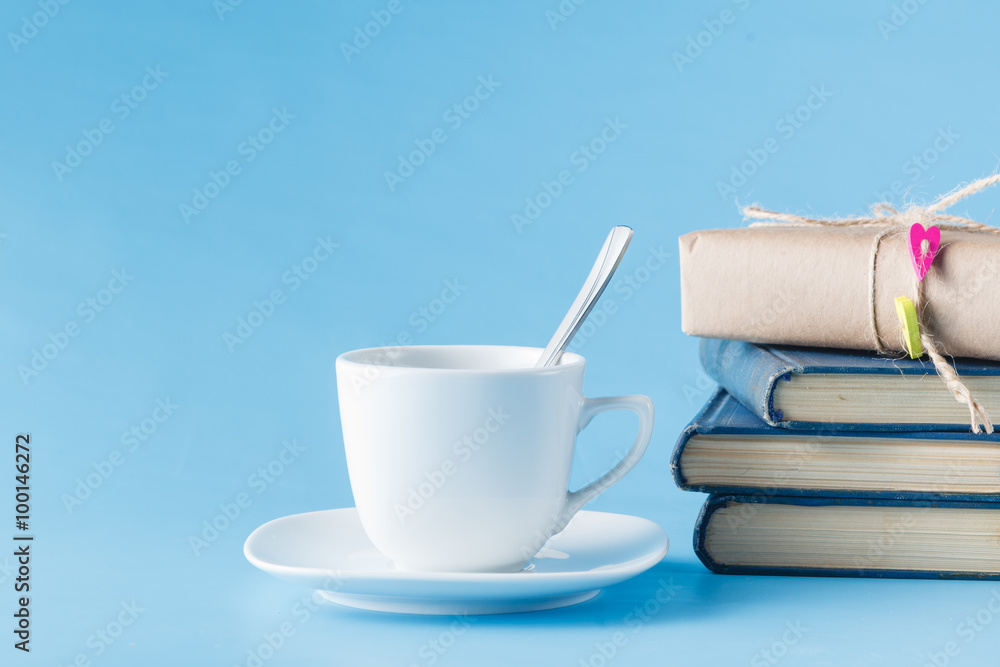 Old books and cup of coffee Old books and cup of coffee