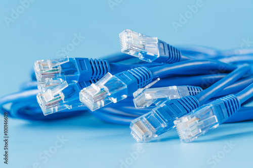 blue computer ethernet cable on blue background