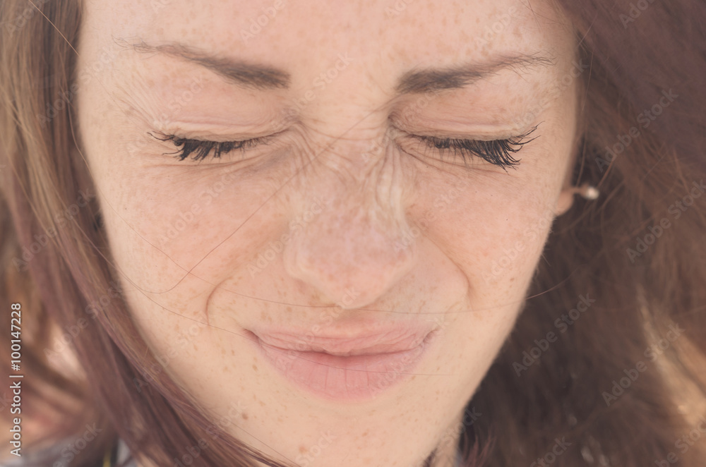 Attractive caucasian girl is grimacing outdoor Attractive caucasian girl is grimacing outdoor