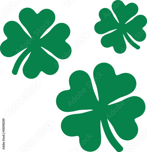 Three flying shamrocks with four leaves