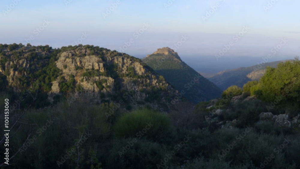Time lapse of sunlight gradually covering hills. Cropped. Time lapse of sunlight gradually covering hills. Cropped.
