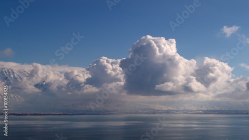 Timelapse shot of flufly cloud formations in Utah. photo