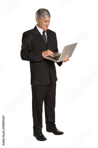 Portrait of a businessman with a tablet computer.