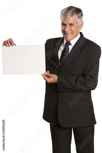 Portrait of happy smiling young business man showing blank signb photo