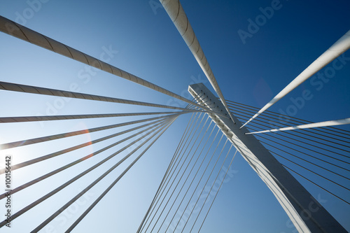 Fototapeta Naklejka Na Ścianę i Meble -  Wonderful white bridge structure over clear blue sky