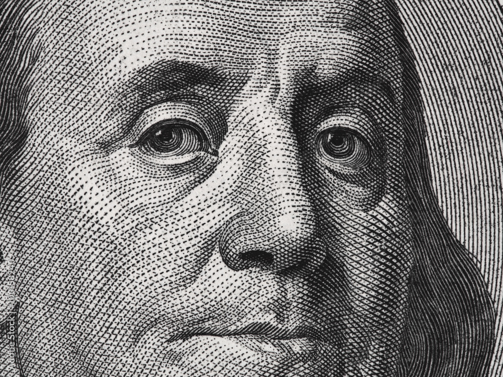 Ben Franklin face on us one hundred dollar bill macro,  united states money closeup